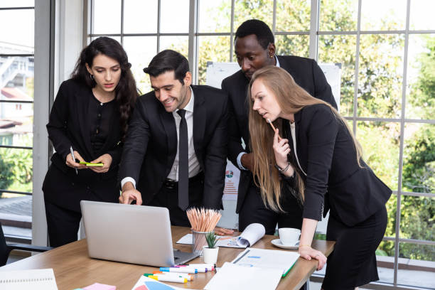 istockphoto-1326955304-612x612 The CEO and management are delighted that the company's profits are better than expected. Marketing team and secretary are meeting on organizational targeting.